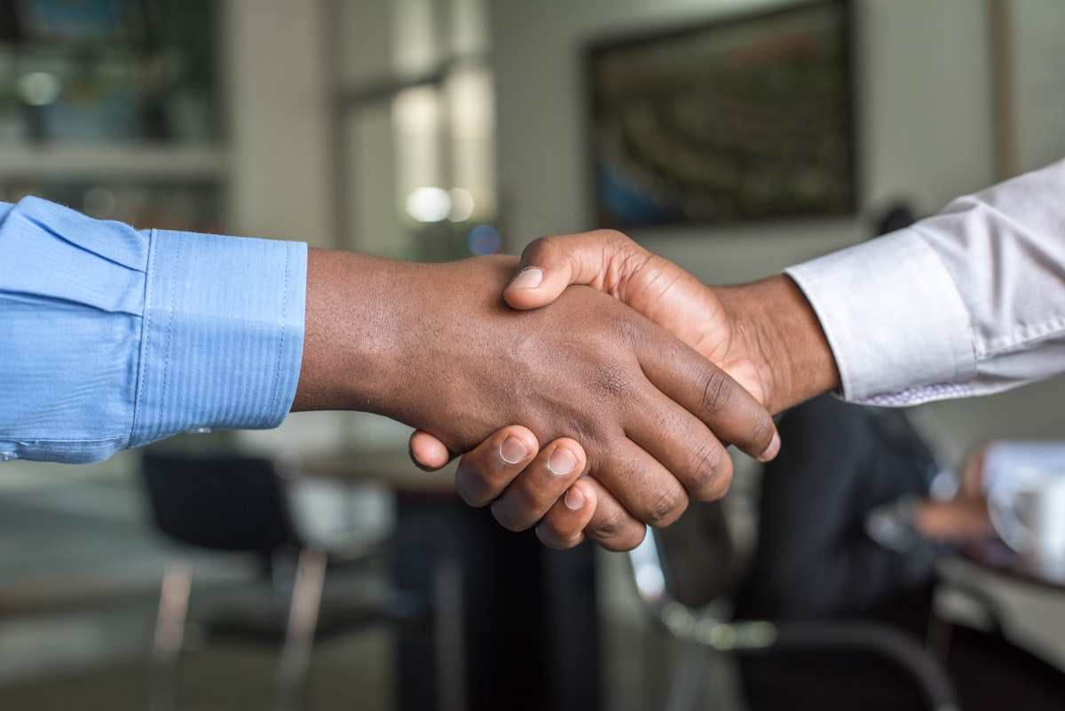 Business handshake – sealing an acquisition